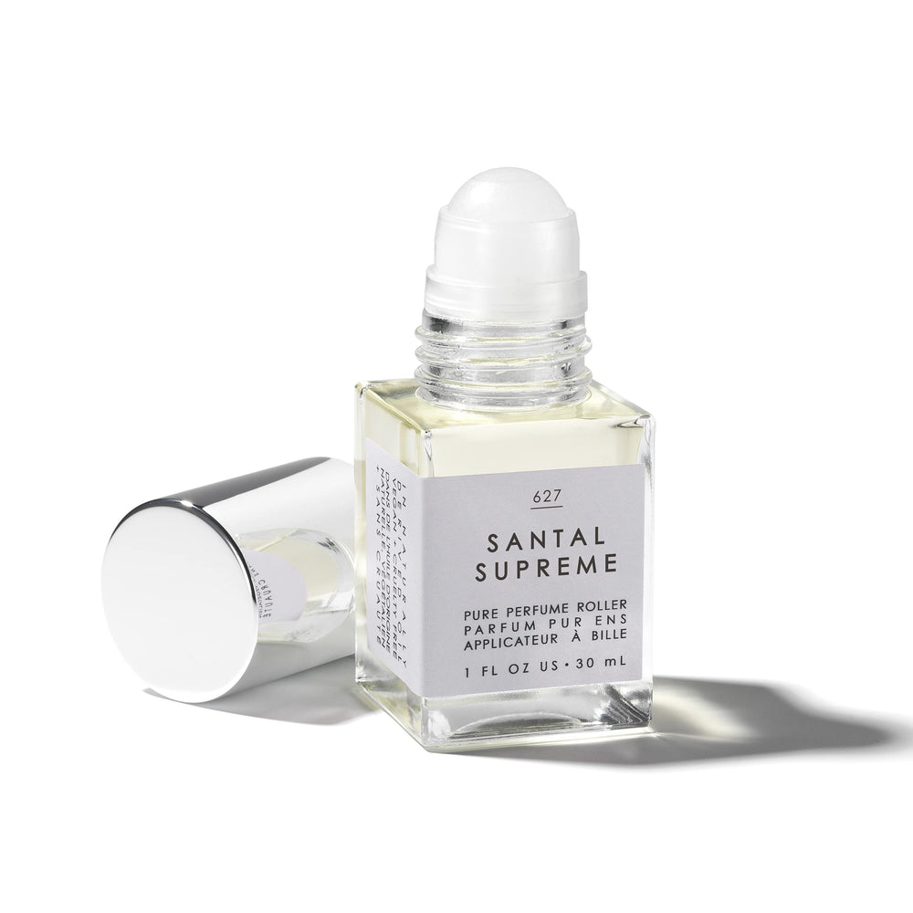 Le Monde Gourmand Santal Supreme vetiver note close-up for earthy depth.