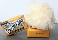 Legend's Creek goat milk soap in hand illustrating gentle cleansing for sensitive skin.