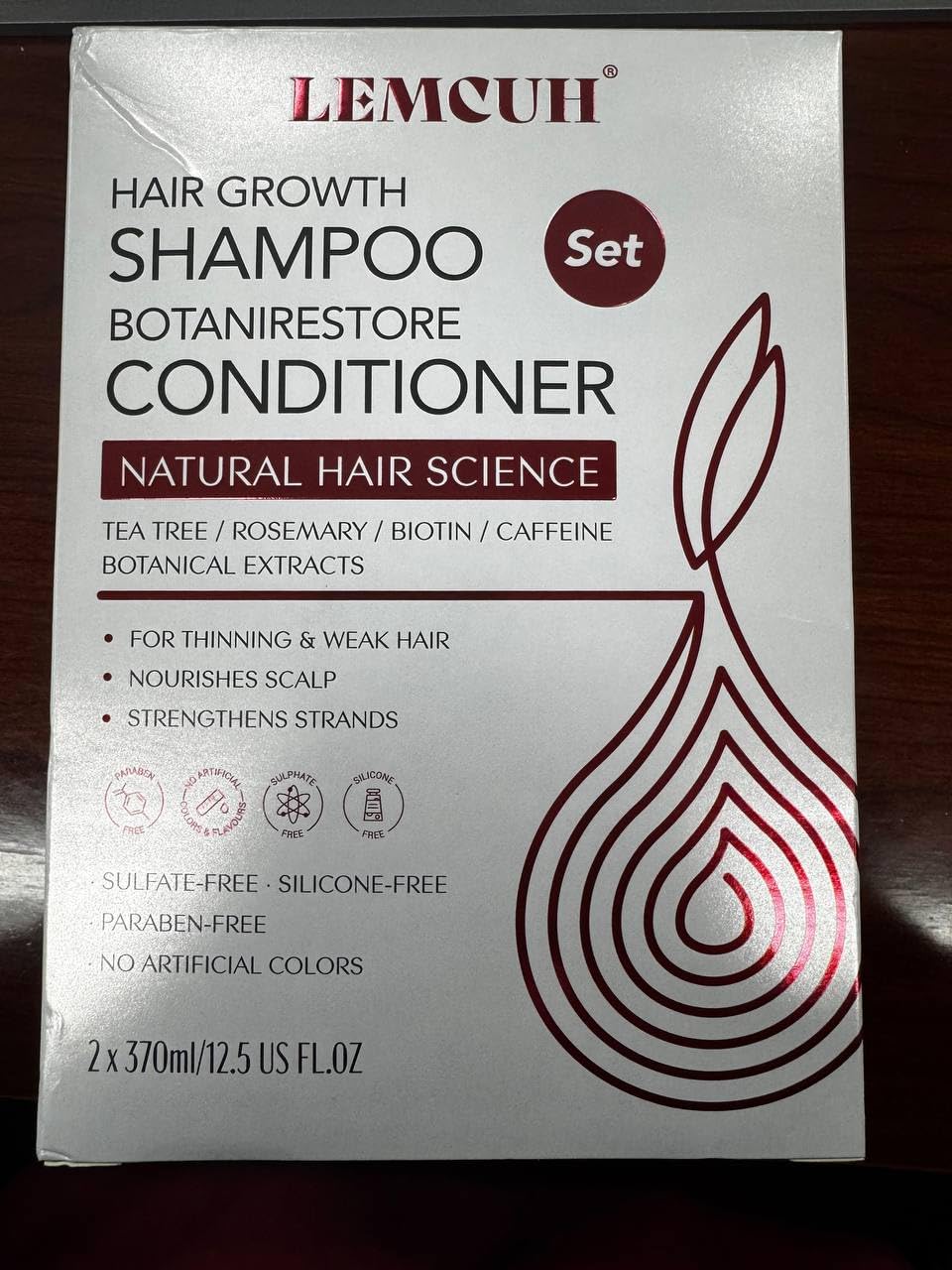 Lemcuh conditioner bottle shown with smooth, silky results
