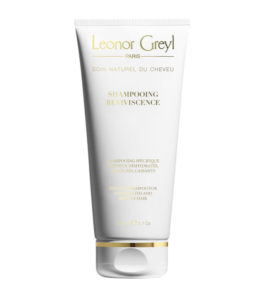 Leonor Greyl Reviviscence shampoo bottle showcases hydrating formula for dry, damaged hair.