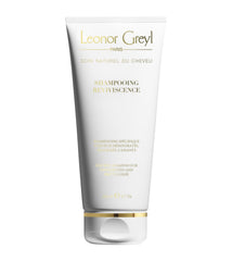 Leonor Greyl Reviviscence shampoo bottle showcases hydrating formula for dry, damaged hair.