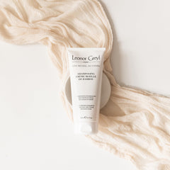 Leonor Greyl Shampoo application scene demonstrates easy cleansing routine.