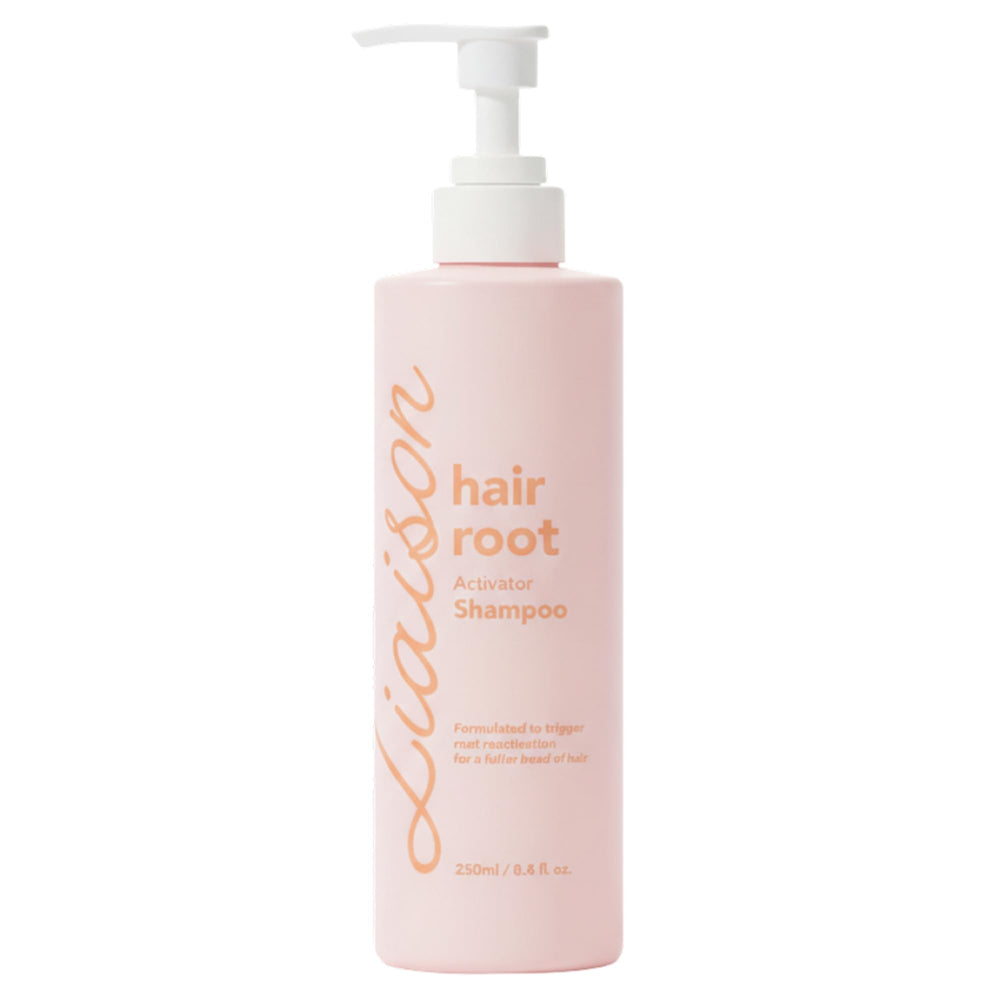 Liaison Hair Bond Shampoo bottle with sea buckthorn promotes hydrated, healthier-looking strands.