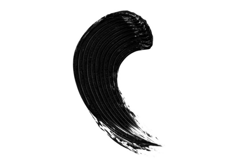 Lisa Eldridge Kitten Lash Mascara curved applicator close-up showing root-to-tip densification.