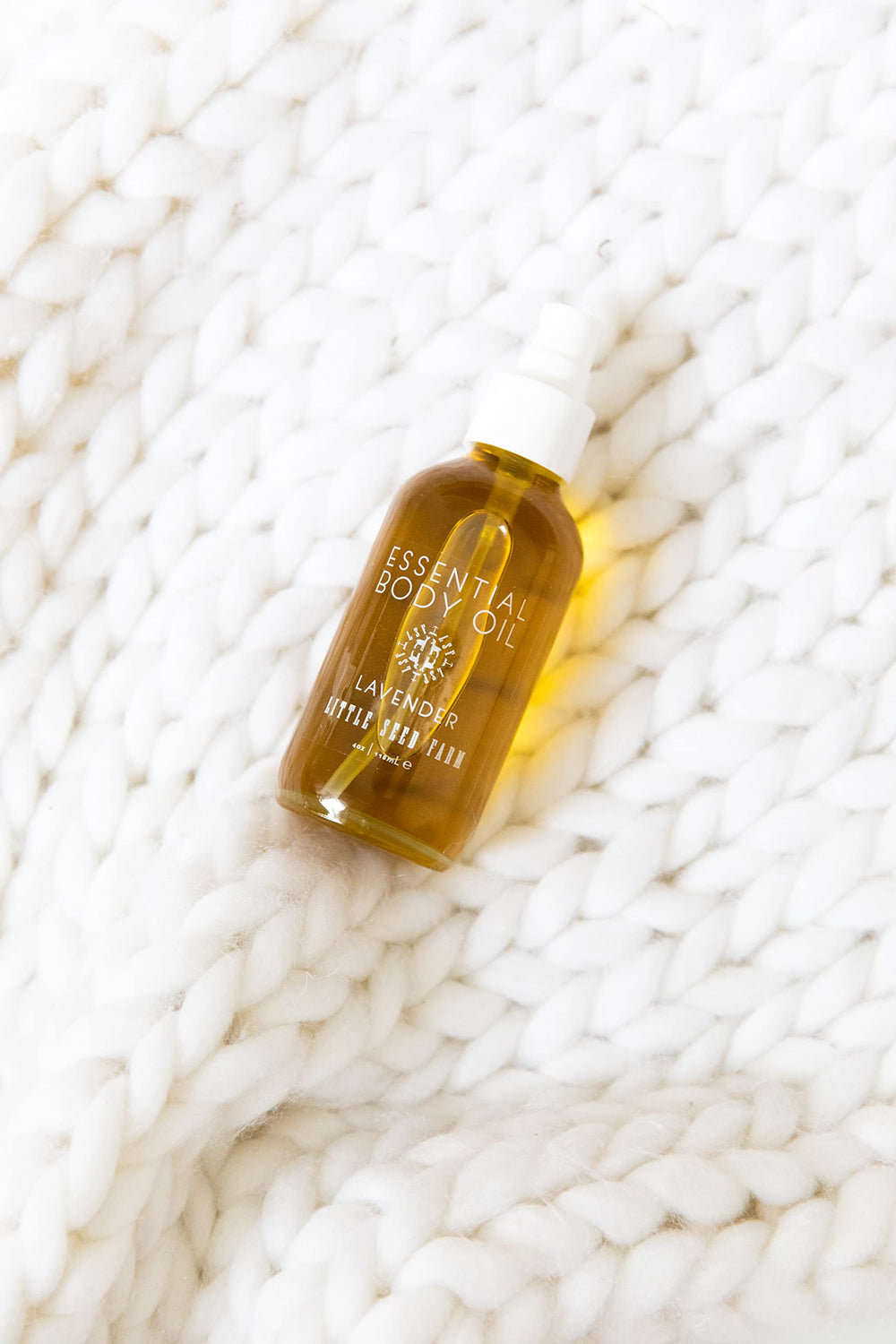 Amber glass bottle from Little Seed Farm preserves freshness and sustainability.