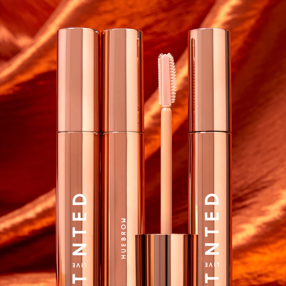 Live Tinted Huebrow clear brow gel flat-side for sleek, defined brows.