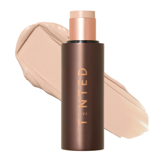 Live Tinted HUESTICK compact bottle for on-the-go coverage.