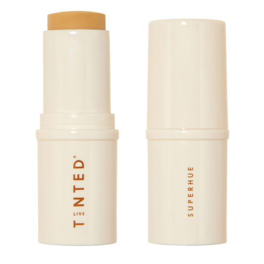 Live Tinted Superhue serum stick on the face for targeted dark spot brightening
