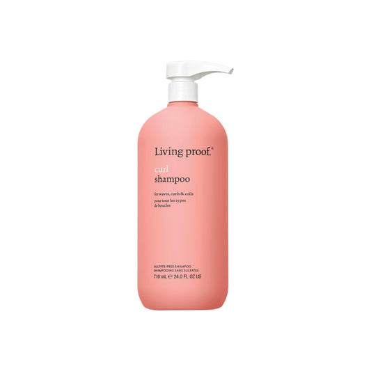 Living Proof Curl Shampoo bottle with pump enables effortless cleansing for defined curls.