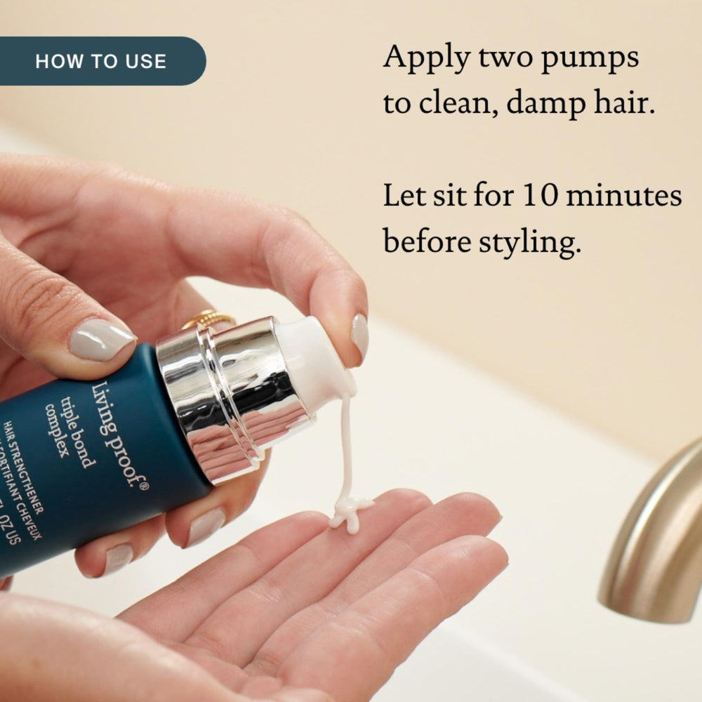 Living Proof leave-in application on hands shows easy scalp-to-ends usage.