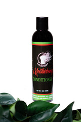 Loclicious Moisturizing Conditioner bottle pouring for easy locs nourishment.