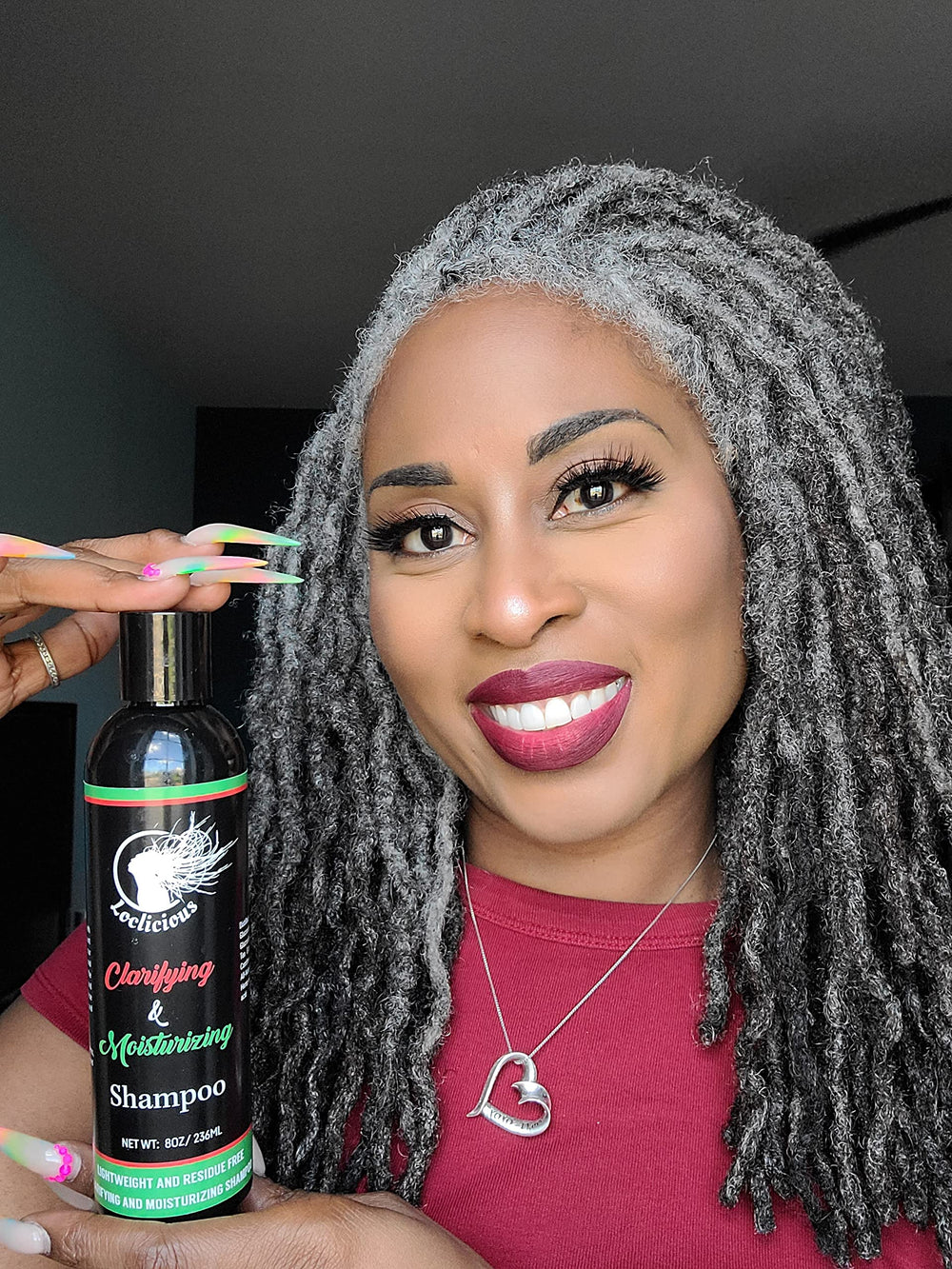 Loclicious Moisturizing Conditioner on locs supporting soft, hydrated hair.
