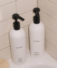 Lolavie Mega Wash Day Essentials bottle—restorative shampoo and conditioner for stronger, hydrated hair.