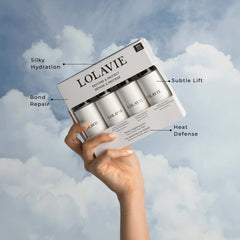 LolaVie Restorative Conditioner travel-size bottle for detangling and silky softness.