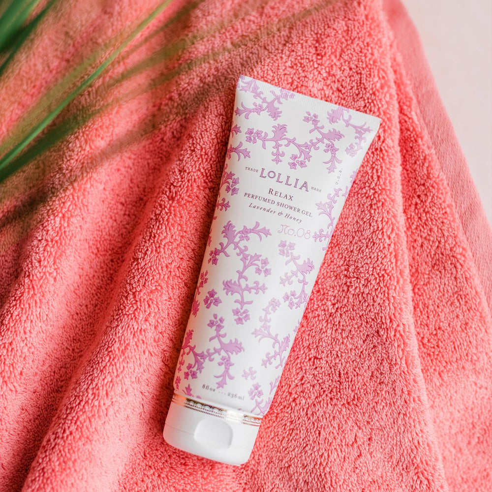 Bathroom setup featuring LOLLIA Relax Shower Gel for everyday luxury.