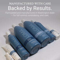 LOMA Moisturizing Shampoo haircare in sink demonstrates gentle cleansing for dry ends.