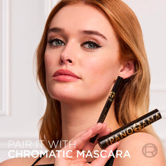 Applying Haute Precision eyeliner to the upper lash line for defined look.