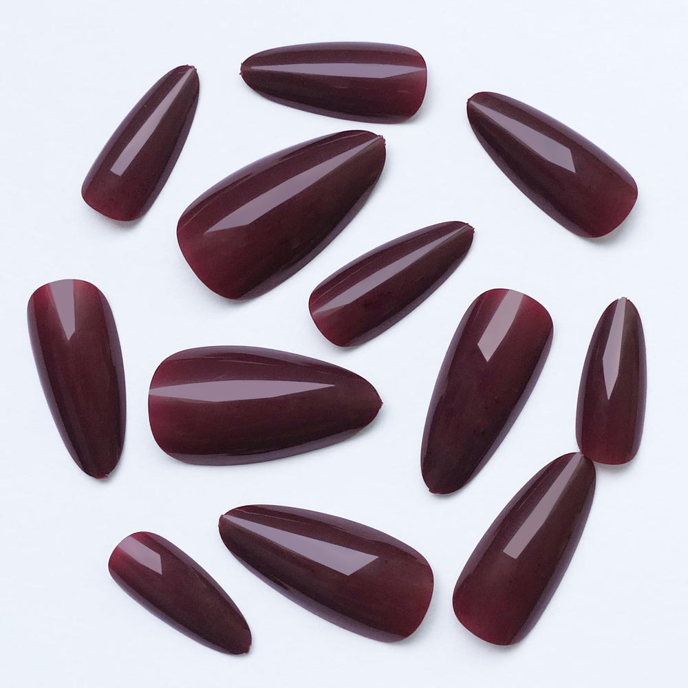 LoveOurHome hands wearing press-on nails for everyday wear.