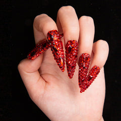 LOVFUL full-covered crystals nails catch light for a statement manicure.