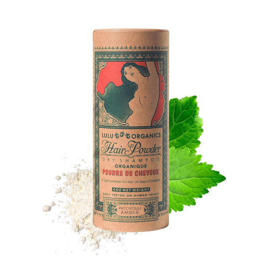 Lulu Organics dry shampoo powder bottle for quick refresh with no white residue.