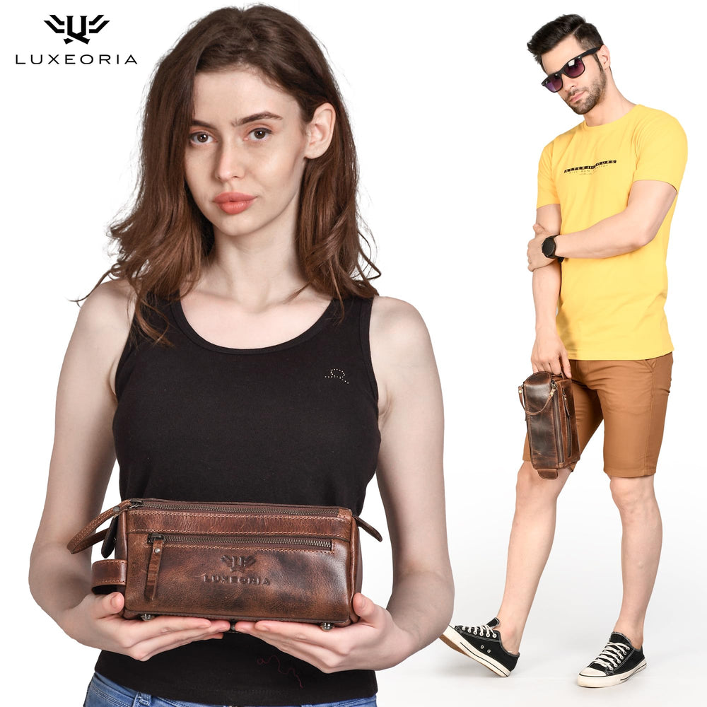 LUXEORIA chocolate leather toiletry bag showing lower pocket for organizing small items.