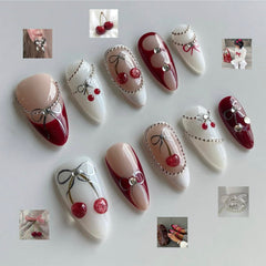 MABKJLF nails with 3D rhinestones and bow accent for stylish look