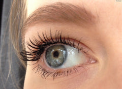 Deep black MAC mascara on lashes for intensified color.
