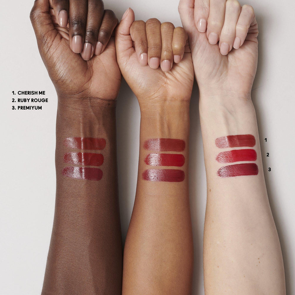 MAC Mini Lustreglass Ruby Rouge — glossy red lip finish for a luminous look.