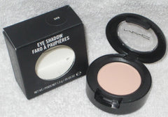 MAC Orb Eye Shadow close-up in soft beige pigment for brightening lids and versatile everyday looks.