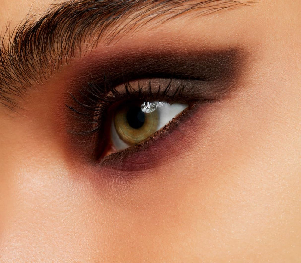 MAC Powder Kiss Soft Matte Eye Shadow Pro Palette On The Go offers portable diffused color for looks.