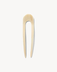 MACHETE hair pin with glossy finish highlights luxurious shine while keeping hair in place.