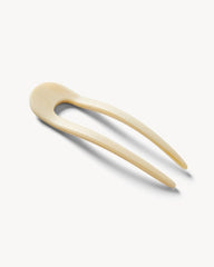 MACHETE thicker-build hair pin helps reduce breakage for lasting styling.