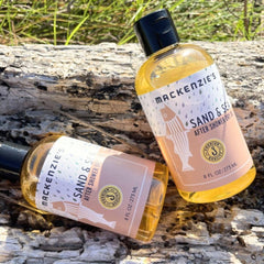 MACKENZIE'S Sand & Sea dry oil being poured to show fast absorption.
