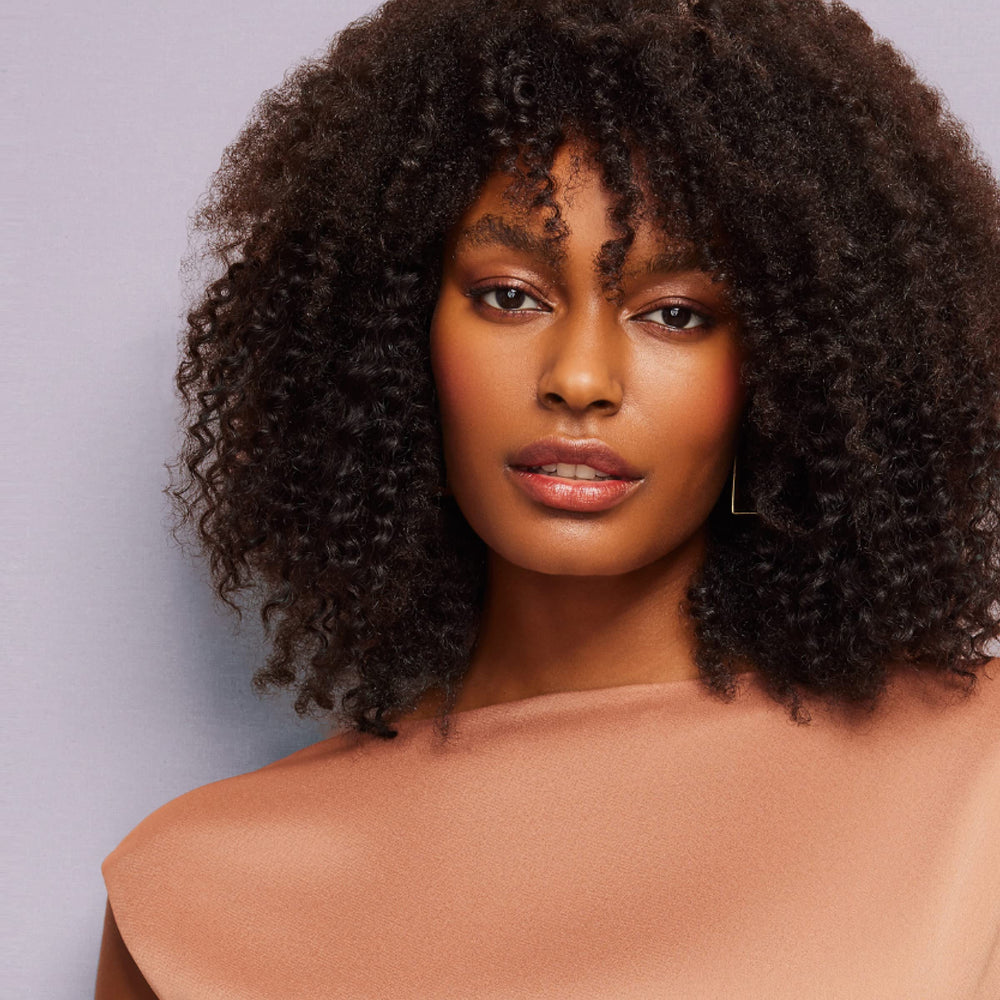 Madison Reed hair after conditioning shows smoother, more manageable waves.