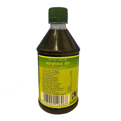 Mahabhringaraj Oil label closeup highlighting pure ingredients for improved hair moisture