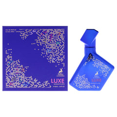 Maison Alhambra Luxe Nightlife bottle pour showing smoky, contemporary evening presence