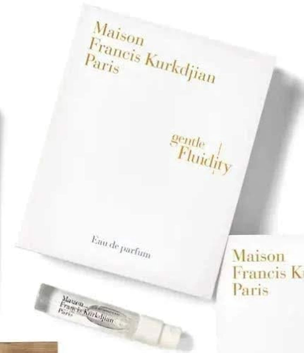 Gentle Fluidity Gold 2ml bottle by Maison Francis Kurkdjian; warm vanilla for refined evenings.