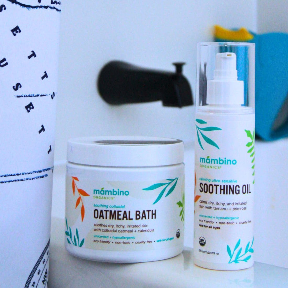 Mambino Organics family-use scene showing multipurpose set for baby bath, massage, and daily skin care