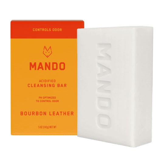 Mando Acidified Cleansing Bar bourbon leather packaging shows compact, odor-control design