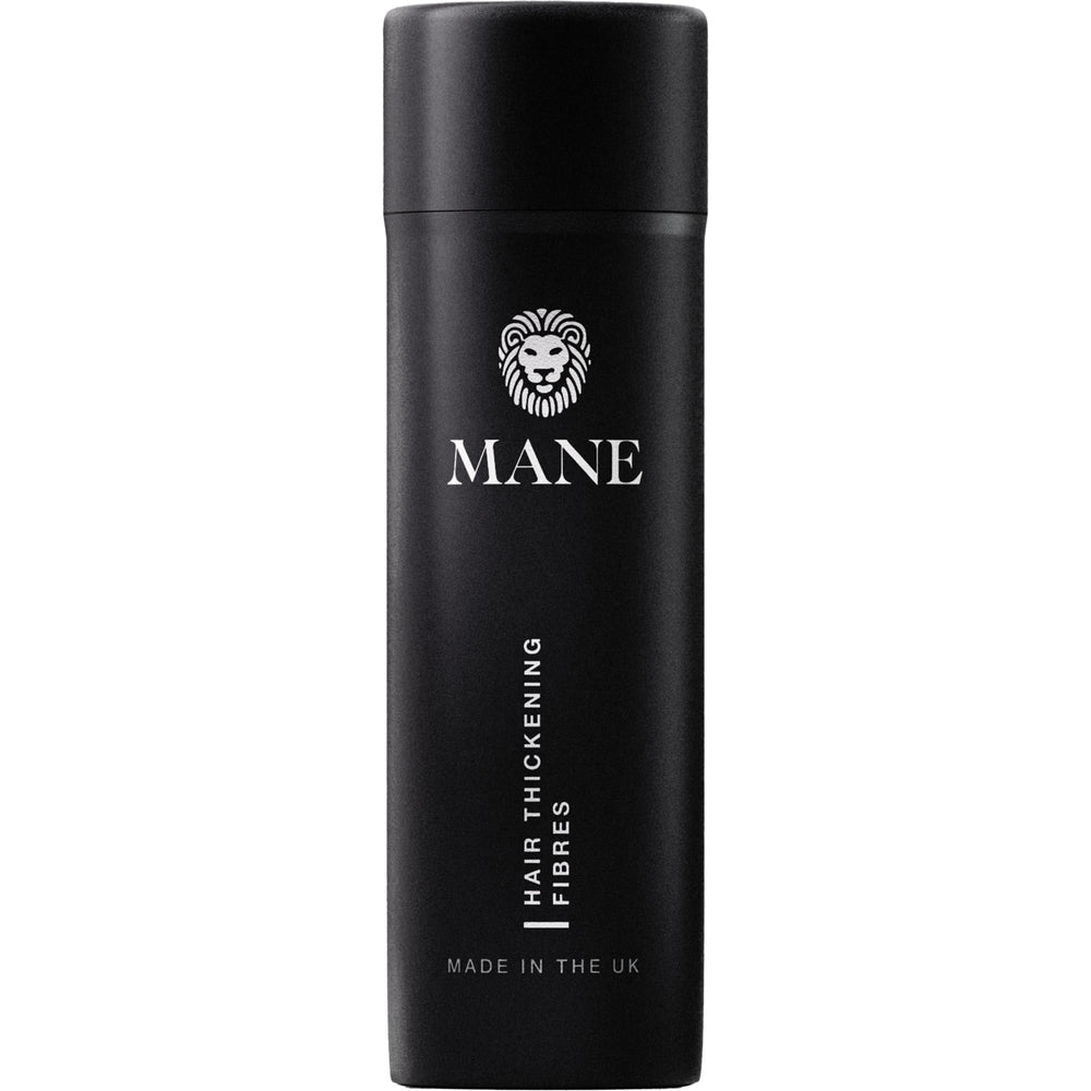 MANE Hair Building Fibers Jet Black blend naturally at the crown.