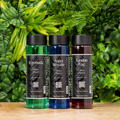 MANE TAME Bermuda on wood surface highlights warm cedar and vetiver base