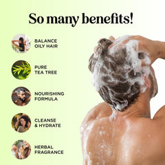 Maple Holistics Tea Tree Shampoo label closeup highlights natural cleansing ingredients.