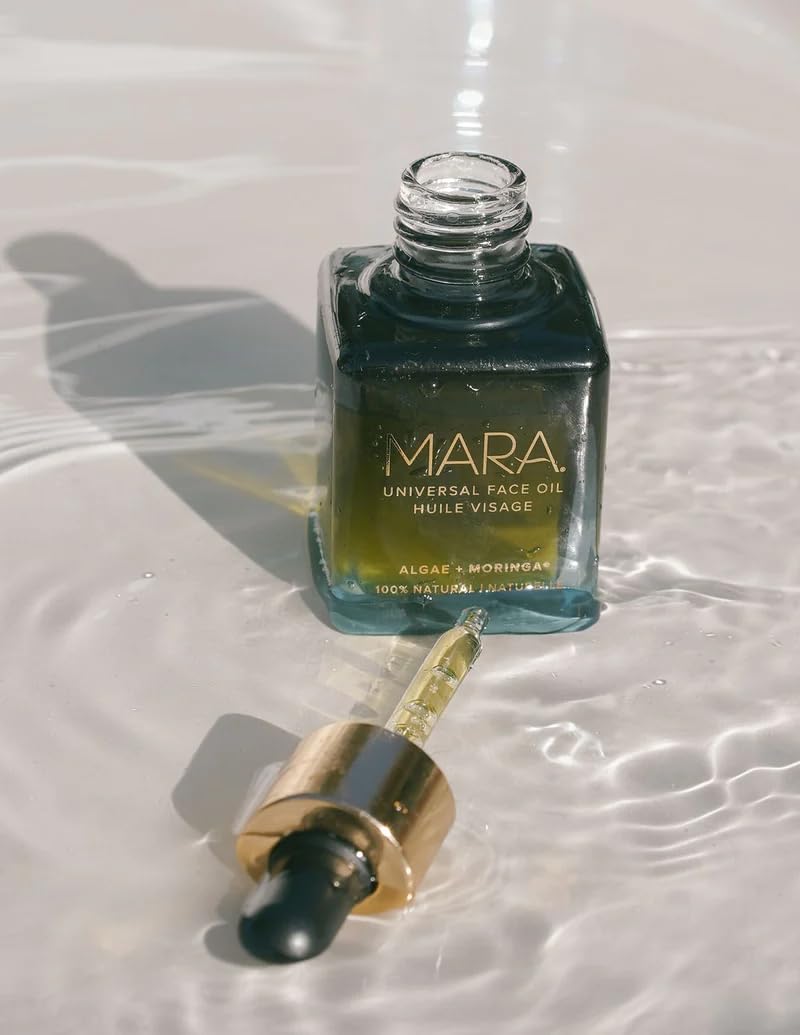 MARA Spa-like oil ritual setup with bottle and greenery
