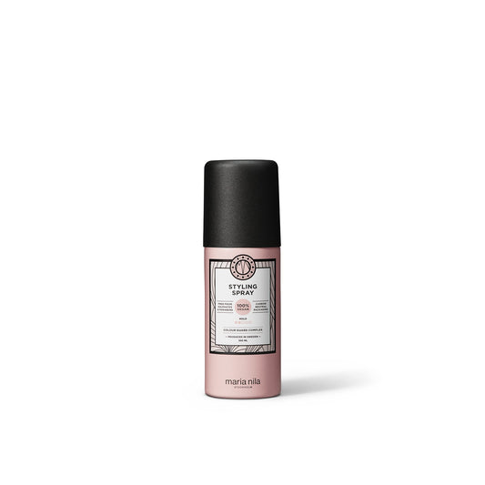 Maria Nila Styling Spray bottle close-up showing light hold and shine.