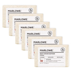 MARLOWE No. 102 Oud Wood body scrub close-up shows smooth, refreshed skin