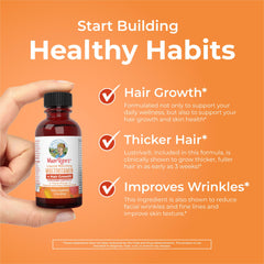 Glass MaryRuth bottle on vanity suggesting a simple morning routine.