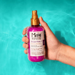 Maui Moisture Frizz-Free Leave-In Mist close-up on bottle with product clarity.