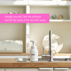 MAY MEDIC Baby Powder Hand Soap foaming action in a bathroom setting.