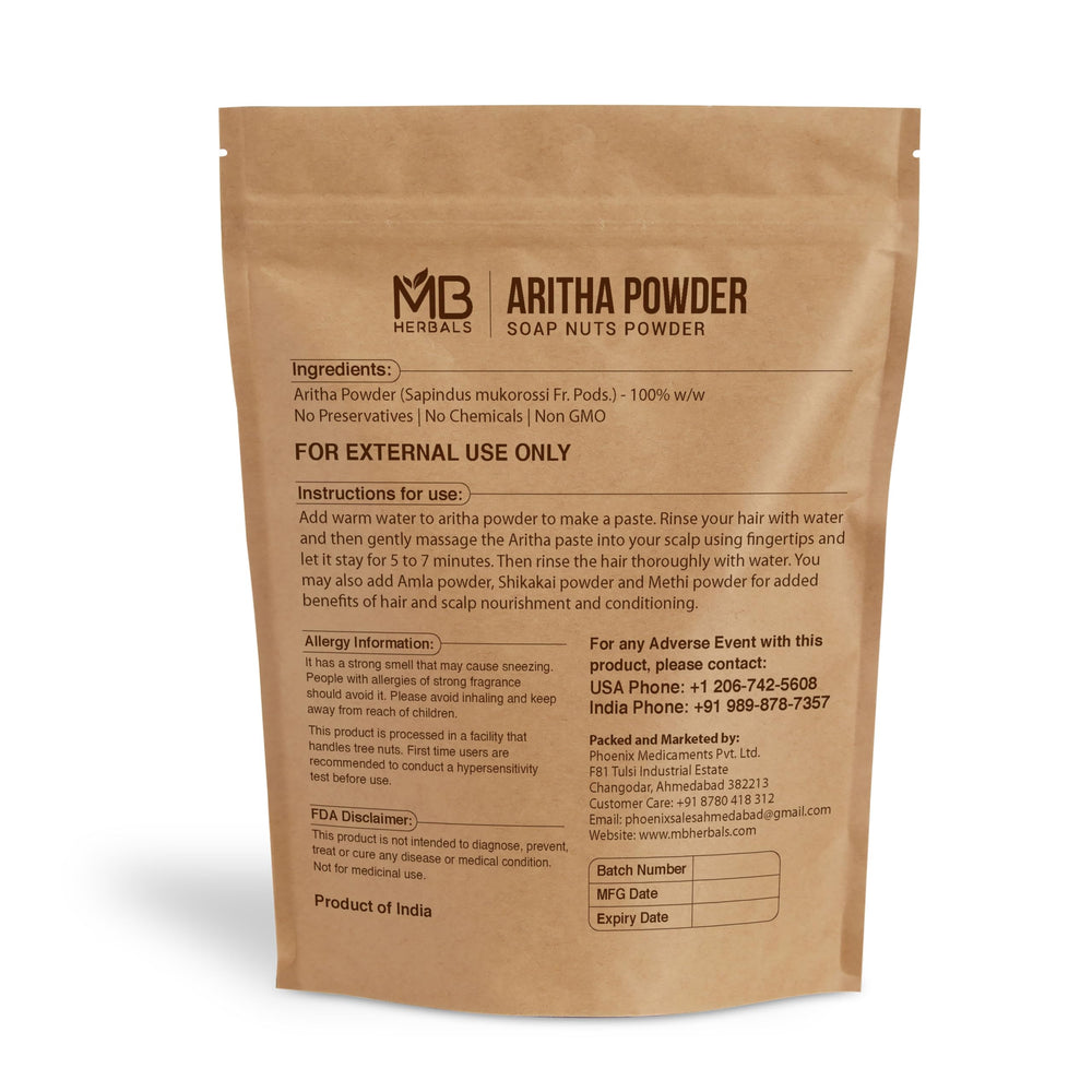 MB Herbals Aritha Powder spoon showing a natural, chemical-free hair cleansing option.