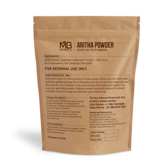 MB Herbals Aritha Powder spoon showing a natural, chemical-free hair cleansing option.
